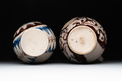Two Westerwald stoneware jugs, one dated 1715, 18th C.