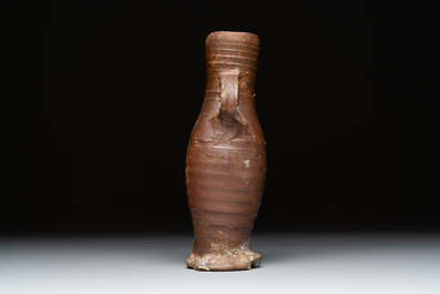 Eight stoneware jugs and mugs, and a glazed pottery vessel, Germany and The Netherlands, 16/17th C.