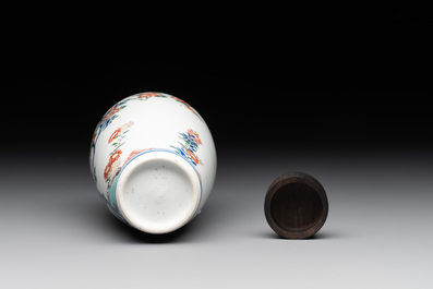 A Chinese famille verte ovoid tea caddy with floral design and a cup with figural design, Kangxi