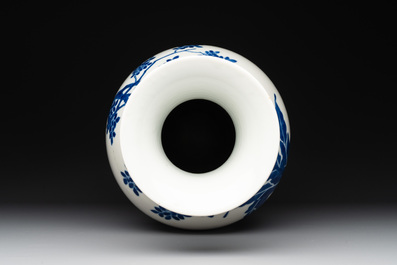 A Chinese blue and white vase with ladies and playing boys in a garden, 19th C.