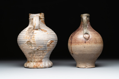Eight stoneware jugs and mugs, and a glazed pottery vessel, Germany and The Netherlands, 16/17th C.