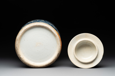 A near pair of Chinese blue and white 'landscape' vases and covers, 19th C.