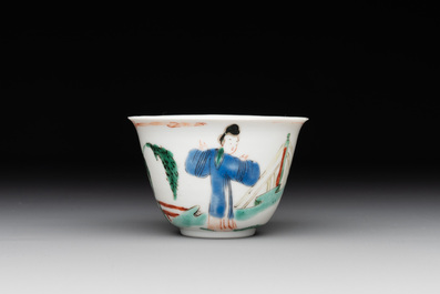 A Chinese famille verte ovoid tea caddy with floral design and a cup with figural design, Kangxi