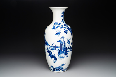 A Chinese blue and white vase with ladies and playing boys in a garden, 19th C.