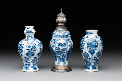 Two Chinese blue and white ewers and three vases, one silver mounted, Kangxi