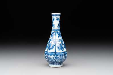 A Chinese blue and white facetted bottle vase with floral design, Kangxi