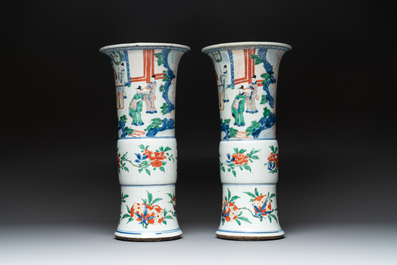 A pair of Chinese wucai 'gu' vases with narrative design, Transitional period