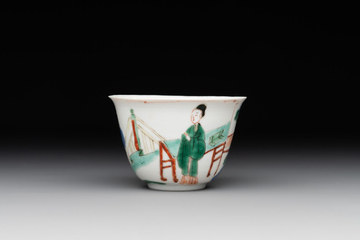 A Chinese famille verte ovoid tea caddy with floral design and a cup with figural design, Kangxi