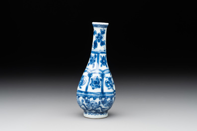 A Chinese blue and white facetted bottle vase with floral design, Kangxi