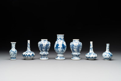 Seven Chinese miniature blue and white vases, Kangxi and later