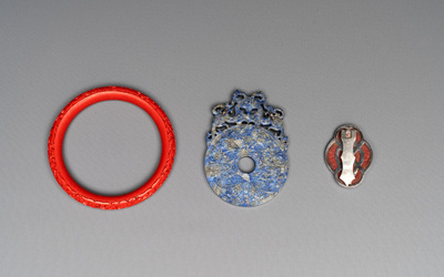 11 Chinese lacquer, carved stone and porcelain wares,  20th C.