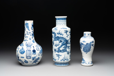Three Chinese blue and white vases with antiquities, dragons and figures, 19th C.