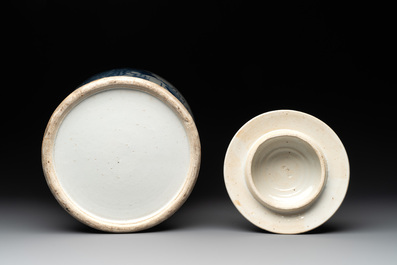 A near pair of Chinese blue and white 'landscape' vases and covers, 19th C.