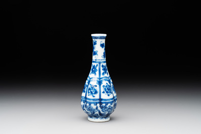 A Chinese blue and white facetted bottle vase with floral design, Kangxi