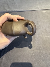 A collection of 20 Chinese Yixing stoneware teapots, 20th C.