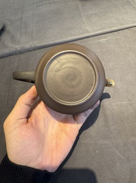 A collection of 20 Chinese Yixing stoneware teapots, 20th C.