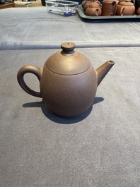 A collection of 20 Chinese Yixing stoneware teapots, 20th C.