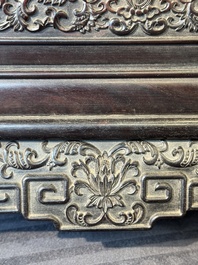 A Chinese zitan wood 'duo bao ge' cabinet of curiosities with carved floral design, 19th C.
