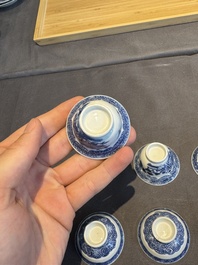 A collection of 32 pieces Chinese blue and white cups, saucers and covers with floral design, Qianlong