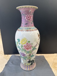 A pair of Chinese famille rose vases and two vases, Qianlong mark, 20th C.