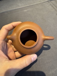 A collection of 20 Chinese Yixing stoneware teapots, 20th C.