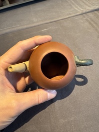 A collection of 20 Chinese Yixing stoneware teapots, 20th C.