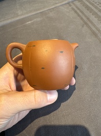 A collection of 20 Chinese Yixing stoneware teapots, 20th C.