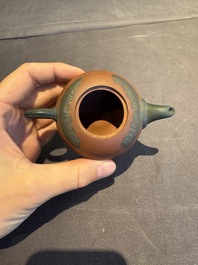 A collection of 20 Chinese Yixing stoneware teapots, 20th C.