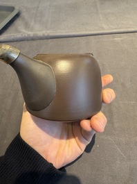 A collection of 20 Chinese Yixing stoneware teapots, 20th C.