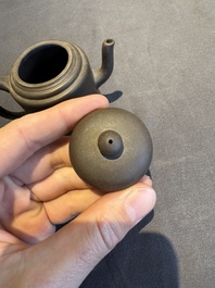 A collection of 20 Chinese Yixing stoneware teapots, 20th C.