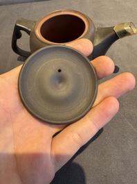 A collection of 20 Chinese Yixing stoneware teapots, 20th C.