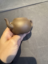 A collection of 20 Chinese Yixing stoneware teapots, 20th C.