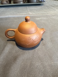 A collection of 20 Chinese Yixing stoneware teapots, 20th C.