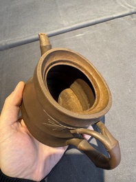 A collection of 20 Chinese Yixing stoneware teapots, 20th C.