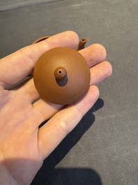 A collection of 20 Chinese Yixing stoneware teapots, 20th C.