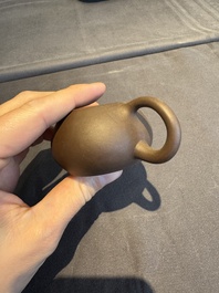 A collection of 20 Chinese Yixing stoneware teapots, 20th C.
