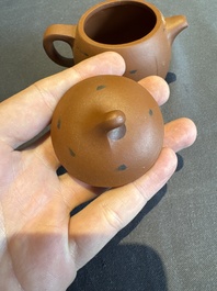 A collection of 20 Chinese Yixing stoneware teapots, 20th C.