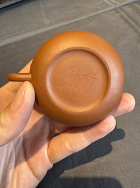 A collection of 20 Chinese Yixing stoneware teapots, 20th C.