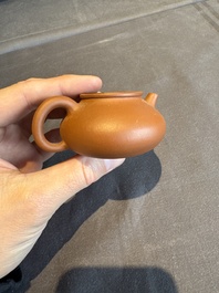 A collection of 20 Chinese Yixing stoneware teapots, 20th C.