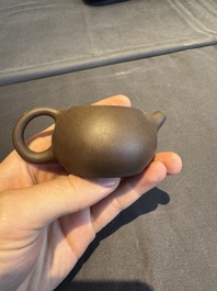 A collection of 20 Chinese Yixing stoneware teapots, 20th C.