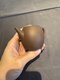 A collection of 20 Chinese Yixing stoneware teapots, 20th C.