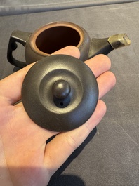 A collection of 20 Chinese Yixing stoneware teapots, 20th C.