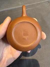 A collection of 20 Chinese Yixing stoneware teapots, 20th C.