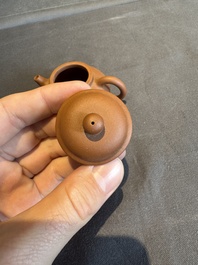 A collection of 20 Chinese Yixing stoneware teapots, 20th C.