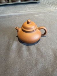 A collection of 20 Chinese Yixing stoneware teapots, 20th C.