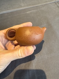 A collection of 20 Chinese Yixing stoneware teapots, 20th C.