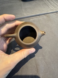 A collection of 20 Chinese Yixing stoneware teapots, 20th C.