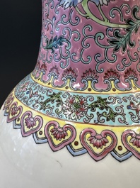 A pair of Chinese famille rose vases and two vases, Qianlong mark, 20th C.