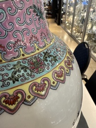 A pair of Chinese famille rose vases and two vases, Qianlong mark, 20th C.