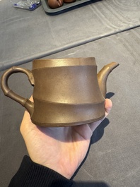 A collection of 20 Chinese Yixing stoneware teapots, 20th C.
